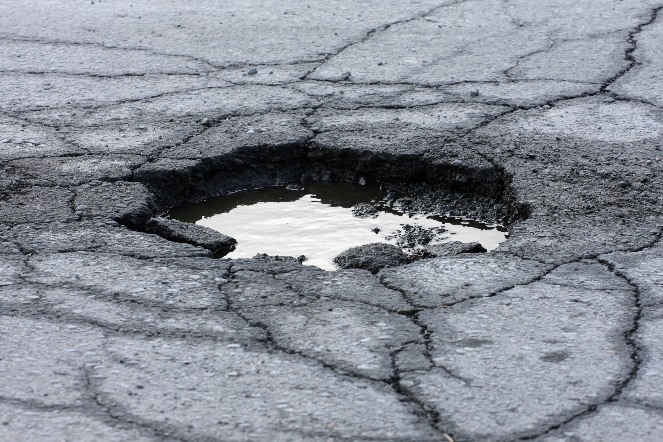 West Tobago – Potholes and Road Damage
